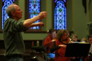 Gordon Stewart conducting a rehearsal in 2013