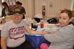 A cholesterol check, at last year's Senior Health Fair.