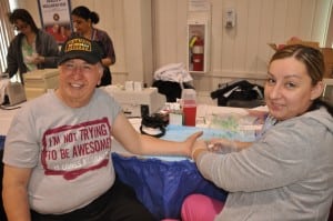 A cholesterol check, at last year's Senior Health Fair. 