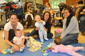 Moms and babies meet up at the breastfeeding support group.