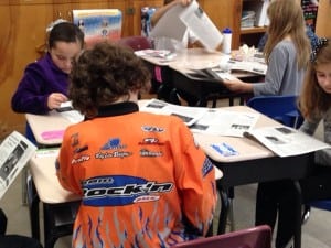 Students in Amy Kuchera's fourth-grade class at Garrison School read the issue of Philipstown.info they produced, hot off the press.