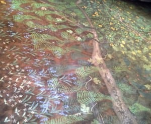 Created by Sheila Rauch, the floor covering for the set of Goblin Market invokes the Pre-Raphaelite style of Rossetti's era.