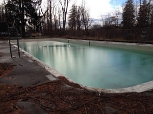 The Beacon Pool in winter awaits a spring thaw and cleanup. (Photo by Mark Price)