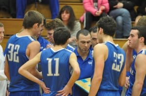 Haldane boys basketball coach Joe Virgadamo discusses strategy with his players in win over Spackenkill.