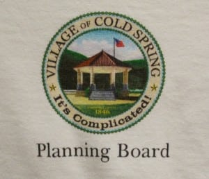 Planning Board Chairman Barney Molloy presented the board members with T-shirts decorated with new twist on the Cold Spring village logo.