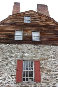 Mount Gulian's distinctive gambrel roof; the stonework below was all that remained after a devastating 1931 fire.  