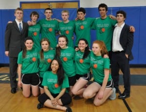 Alex Gariepy, front center, and her junior-year classmates after the faculty vs. students basketball fundraiser at Haldane on Friday, May 1
