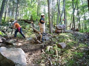 Jolly Rovers at work, "flying" a stone on a highline.