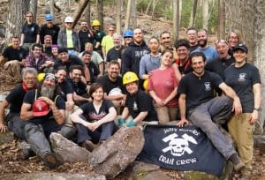 Band of brothers —and sisters — members of the Jolly Rovers trail crew, pictured in their usual habitat: the woods.