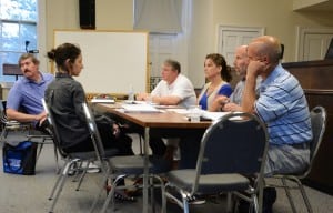 The Philipstown Town Board and Nelsonville Trustee Danielle Pack McCarthy, second from left, discussed consolidation June 10; Town Board members, from right: Councilor John Van Tassel, Supervisor Richard Shea, and Councilors Nancy Montgomery, Robert Flaherty, and Mike Leonard. Photo by L.S. Armstrong