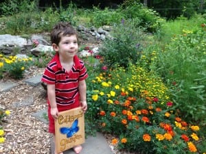 Edison Ford in his butterfly garden, a gift for his third birthday (Photo by P. Doan)