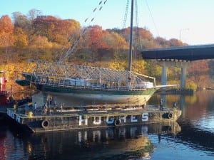 The Clearwater was hoisted onto a barge in Albany, then taken to Kingston for repairs. (Photo provided)