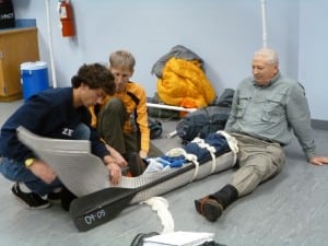 Improvising: a canoe-kayak paddle serves as a splint. (Photo coutesy Matt Kane) 