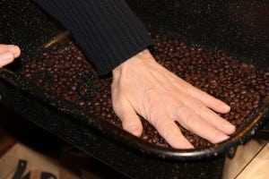 Charles Day — cooling the beans— engages all of the senses in home roasting. (Photo by M.A. Ebner)