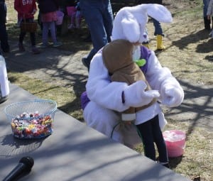 The Easter Bunny greets a child at the hunt (photo provided)