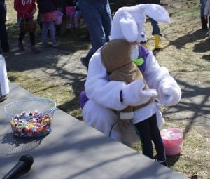 The Easter Bunny greets a child at the hunt (photo provided)  