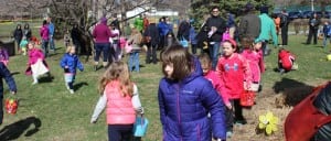 Children scour for eggs at the annual Knights of Columbus egg hunt on March 19 (photo provided)  