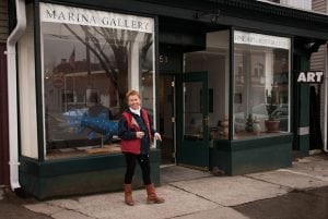 Marina Yashina in front of her Main Street gallery and studio in 2013 (photo by Anne Meadows/Chronogram)