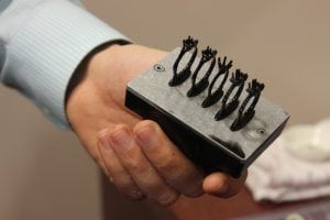 The newest batch of rings-in-the-making emerge from the 3-D printer. (Photo by A. Rooney)