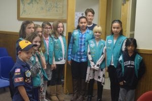 Cold Spring Girl Scout Junior Troop No. 1405 attended the Oct. 11 village board meeting with leader Kathleen Foley. Henry Foley-Hedlund from Cub Scout Pack 137, Wolf Den 4 (left) also attended. (Photo by M. Turton)