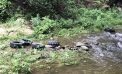 Tires Dumped into Indian Brook Tires Dumped into Indian Brook