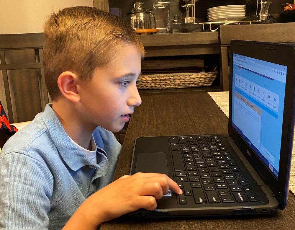 Owen Mekeel at computer