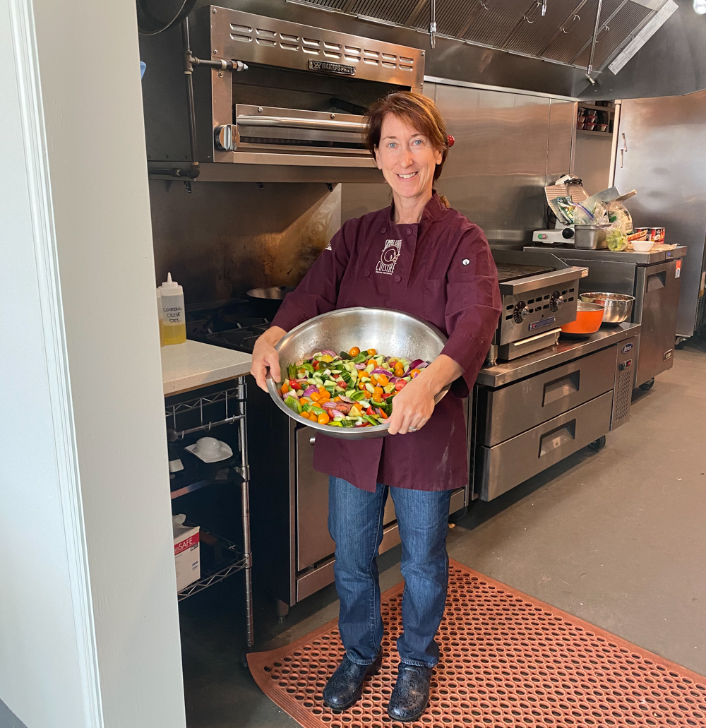 Lisa Caccamise, holding her shepherd's salad