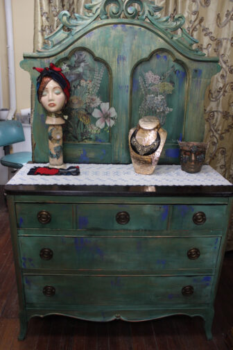 A moody chest of drawers painted and decorated by Judie Gordon