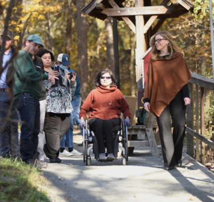 DEC and partners tour the newly restored accessible trail at Stony Kill Farm