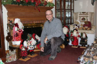 Pralatowski displays some of his Santas at his home in Cold Spring.