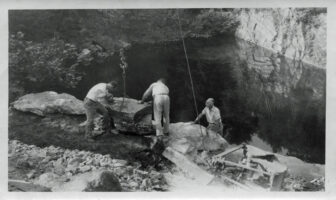 Russel Wright (right) directs boulder placement in the Quarry Pool around 1958