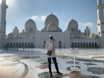 Gwendolyn Bounds stands outside the Sheikh Zayed Grand Mosque in Abu Dhabi, one of the world’s largest mosques. Female visitors must wear head coverings.
