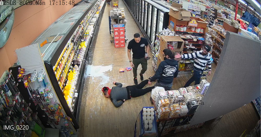 A photo taken from security camera footage at Key Food on March 2, 2020, shows Alvin Medina Jr. on the floor, along with store employee Willie Cole (top), manager Moufaq Dabashi (center) and Emad Dabashi, who was charged with assault.