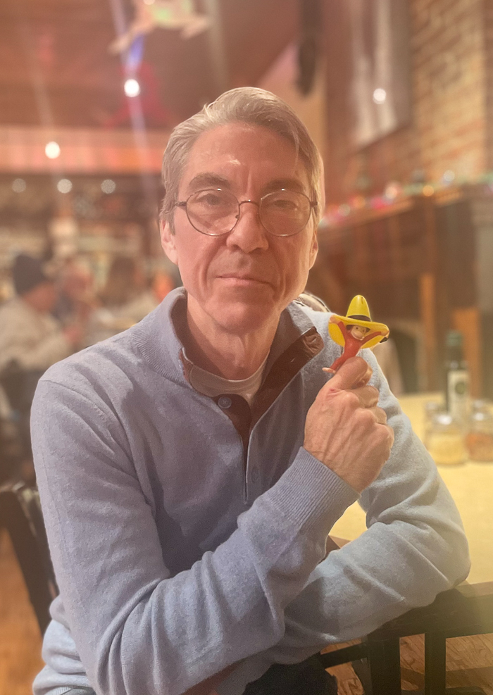 Composer Timothy Brown with the subject of his musical, Curious George