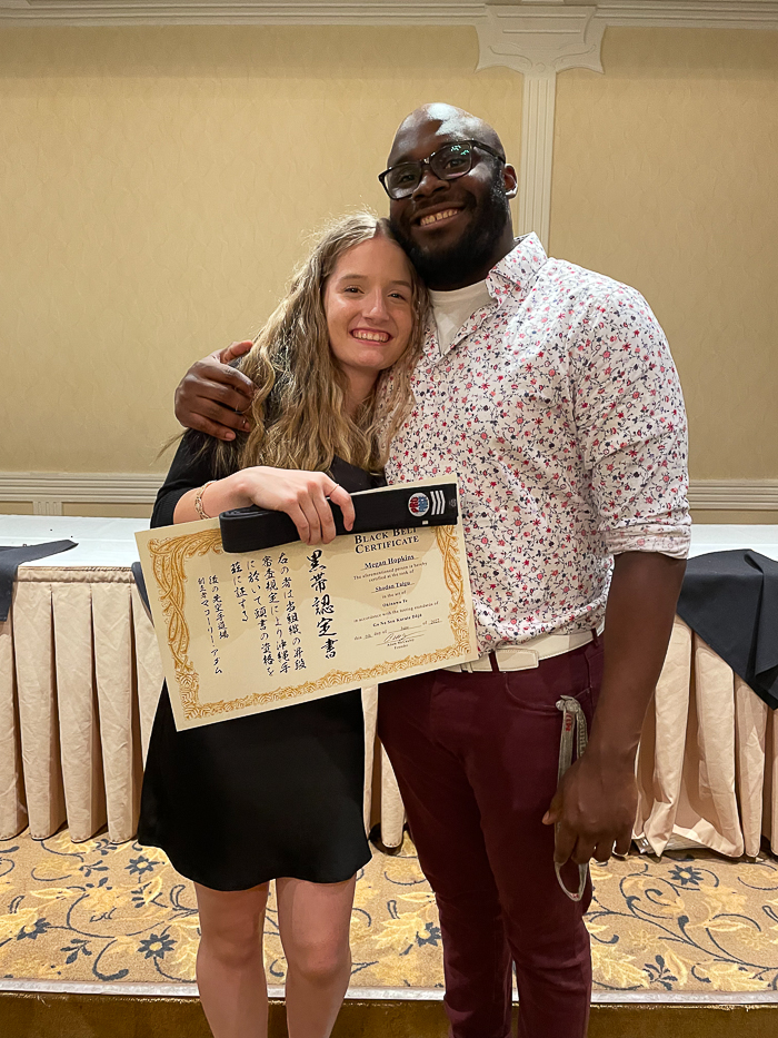 Hopkins earned a black belt after studying with Tyler Smith.