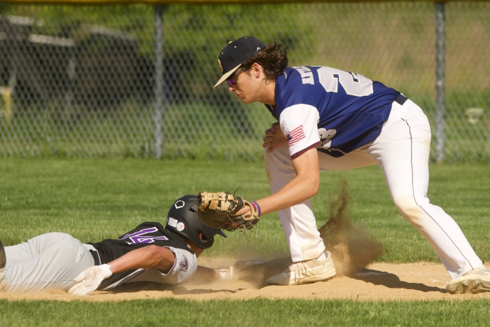 Jack Antalek applies the tag