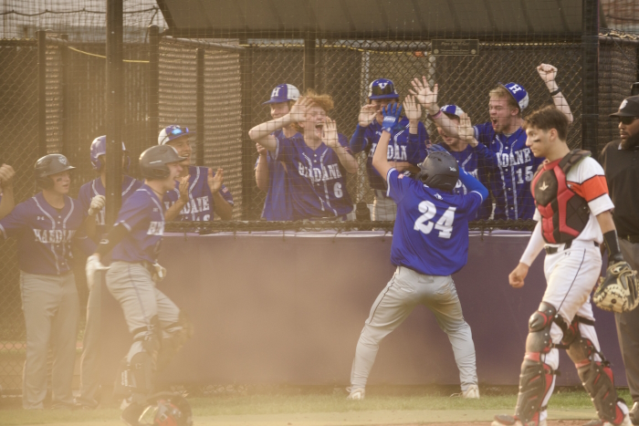 Haldane bench celebrates after Ryan Eng-Wong (24) scored the game-tying (3-3) run
