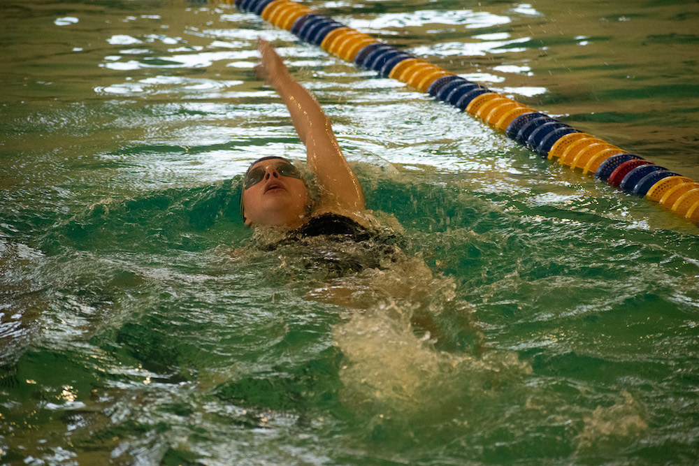 A Beacon swimmer competes in the backstroke against Warwick Valley on Oct. 13. Photo by Una Hoppe