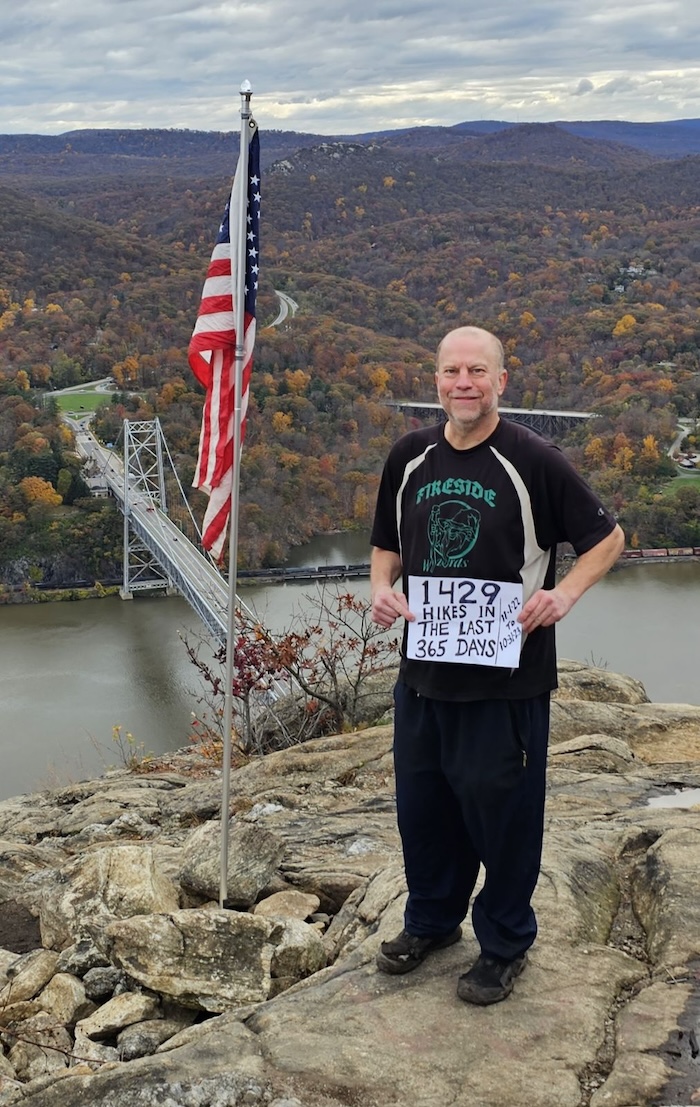 Javenes poses on Anthony's Nose on Oct. 31, the day he completed his 1,429th ascent in a year. Photo provided