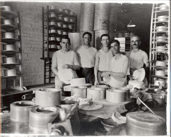 Workers at the Carrols hat shop