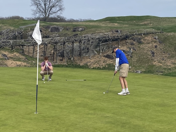 Jake Powers of Haldane lines up a putt during a match earlier this year. Photo by Josiah Peparo