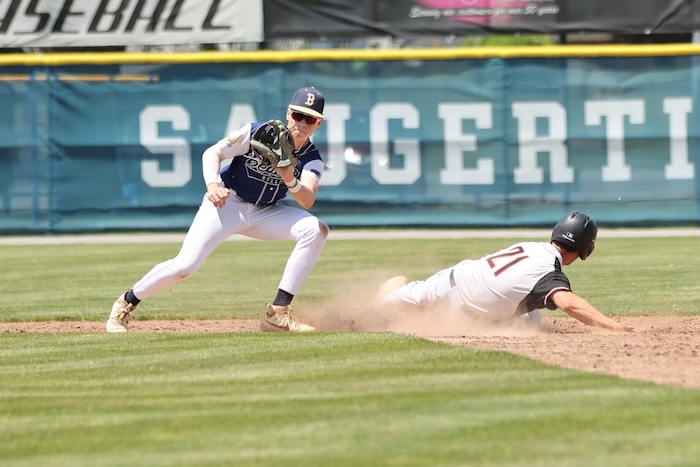 Zack Schetter waits for the ball as a Marlboro runner slides into second during the title game on May 25. Photo by Allyse Pulliam/USA Today