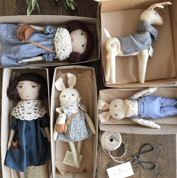 dolls in boxes