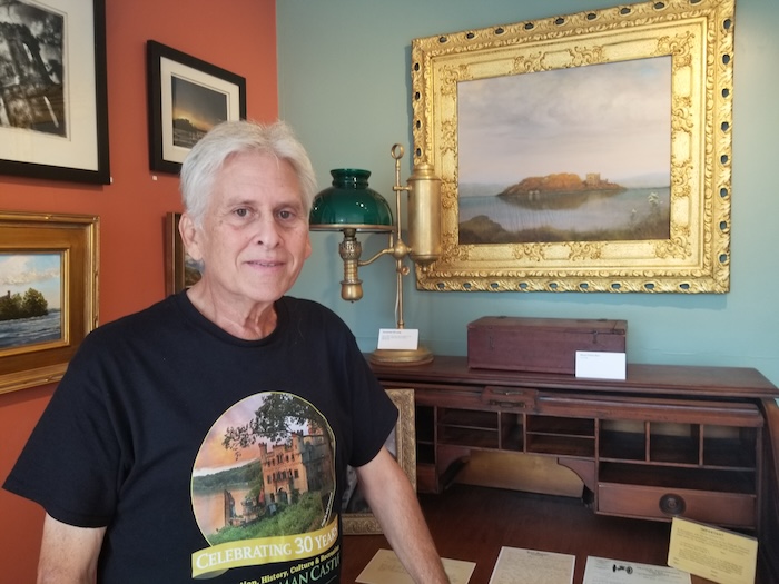 Neal Caplan, the executive director of the Bannerman Castle Trust, with a desk owned by Frank Bannerman (Photos provided)