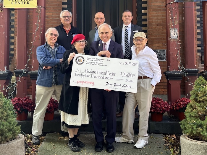 Assembly Member Jonathan Jacobson (center) is shown with (back row) Mayor Lee Kyriacou, City Administrator Chris White and Council Member Dan Aymar-Blair and (front row), Craig Wolf, Theresa Kraft and Thomas de Villiers of the Howland center. Photo provided