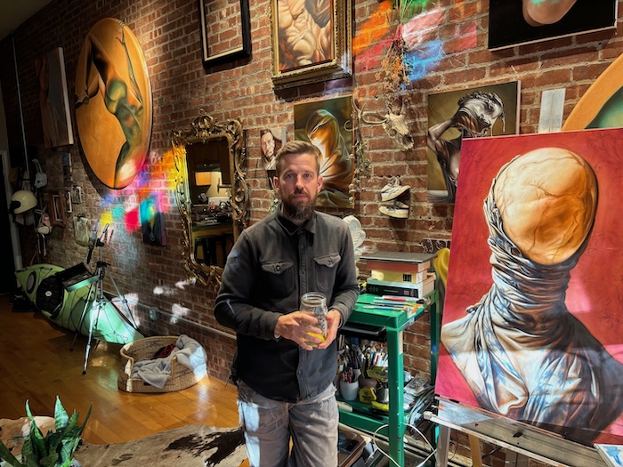 Evan Samuelson with some of his new work