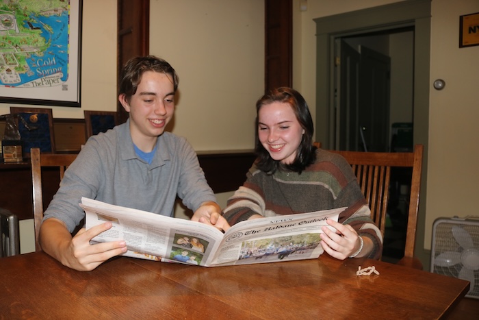Managing Editor Lincoln Wayland and Editor-in-Chief Keira Shanahan look over the first issue of The Haldane Outlook at The Current offices. Photo by M. Turton