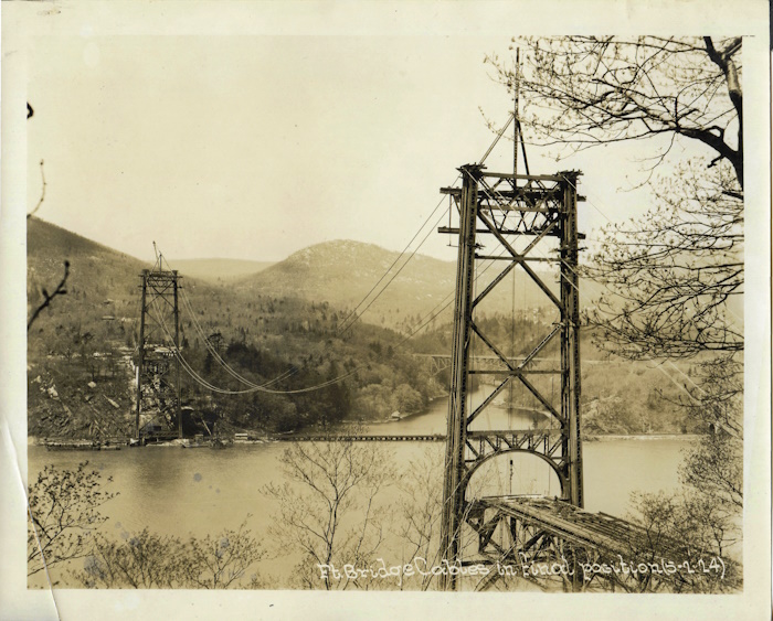 The cables are placed into their final position, May 2, 1924