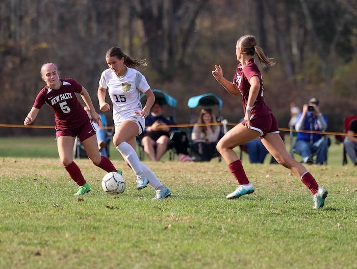Drew Kelly (15) advances the ball against New Paltz in a tournament game on Oct. 30.