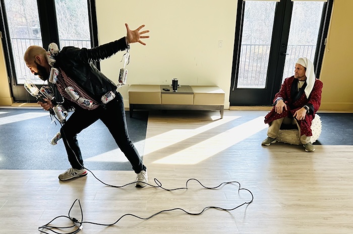 Ken Martinez (Frankob Marley) and John Hartzell (Scrooge) rehearse for the performance. Photo provided